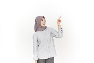 Young Asian woman wearing hijab Pointing side copy space isolated on white background