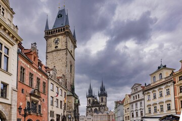 Fototapeta na wymiar Scenic view of the clock tower in Prague, Czechia on a cloudy day