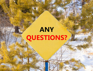 Any questions symbol. Concept words Any questions on beautiful yellow road sign. Beautiful forest...