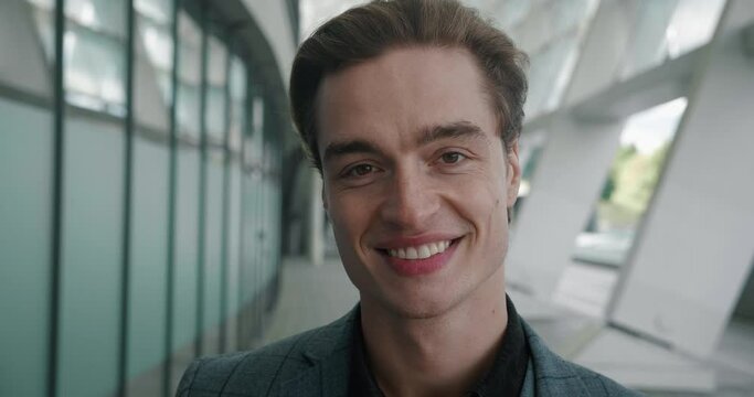 Stylish and poised man's confident look into camera close-up to face. Confident look symbol of his inner strength Confident look unflinching and powerful conveys deep sense of self-belief.