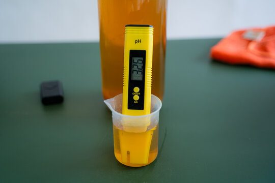 a Yellow pH Meter is used to measure the acidity level of drinks