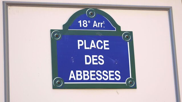 Place des Abbesses street sign in the Montmartre district in Paris, France