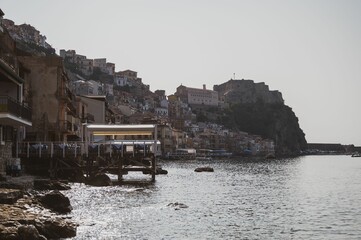 Scenic view of the picturesque fishing village of Chianalea di Scilla, Italy. - obrazy, fototapety, plakaty