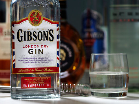 In this photo illustration, a bottle of Gibson's London Dry Gin seen displayed on a table.