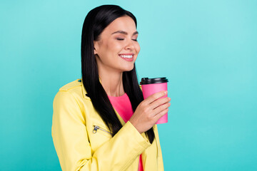 Profile photo of funky young brunette lady smell tea wear yellow jacket isolated on teal color...