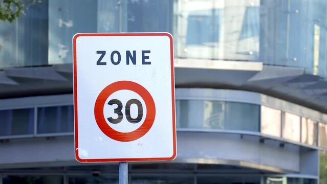 Zone 30 road sign, indicating the limit zone of thirty kilometers per hour for cars and other vehicles