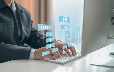 Delegate concept with businessman using computer to  setting an abstract employee hierarchy...