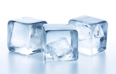 Obraz premium Three melting ice cubes on white background