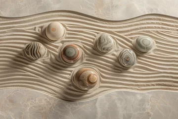 Küchenrückwand glas motiv Patterned sands with stones in calming hues © gearstd