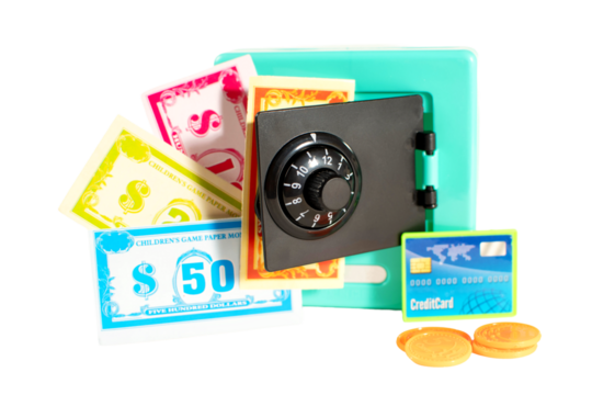 A toy bank with a key and a bunch of money in it. The money included