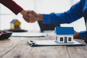 Handshake and business success, Real estate agents and customers shake hands to congratulate after...