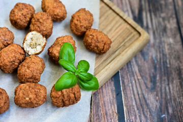 Home made Feta and Olives Stuffed Greek Meatballs .Greek confort food. Mediterranean diet 