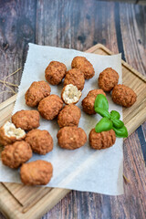 Home made Feta and Olives Stuffed Greek Meatballs .Greek confort food. Mediterranean diet 