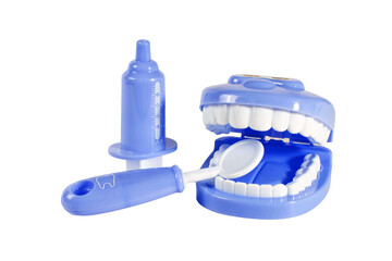 A blue toy dental set with a toothbrush and a syringe