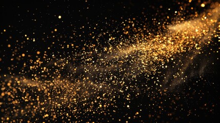 Gold glitter dust. Sparkling shining particles on a black background. Glows confetti shimmering texture.