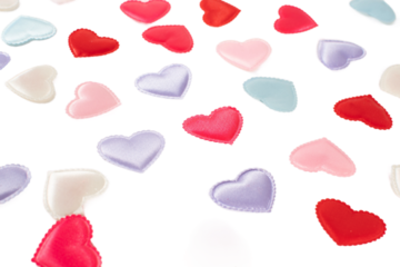 The hearts are of various sizes and colors, creating a vibrant