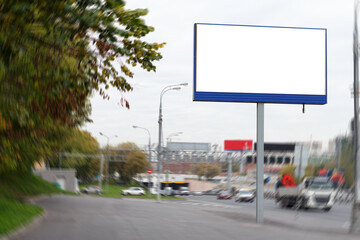 Billboard on a roadside pole on an active city highway.