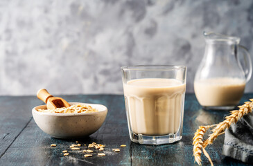 Healthy Oat Milk Setup with Bowl of Oats on Table
