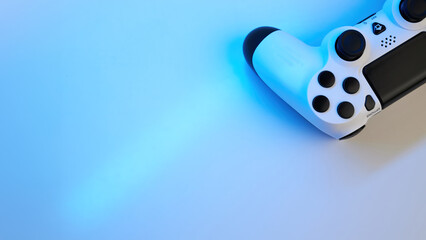 Gamepad on abstract background with light effects © Inna Vlasova