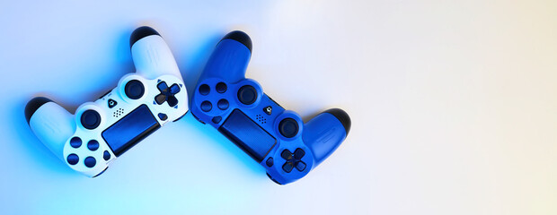Gamepad on abstract background with light effects © Inna Vlasova