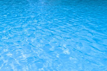 Obraz premium blue water wave texture in swimming pool