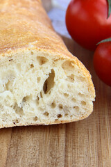 traditional Italian ciabatta bread with fresh basil