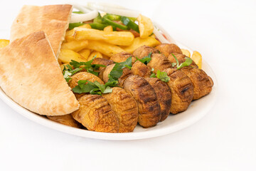 Grilled mushrooms with french fries and salad