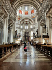 Obraz premium Salzburg, Austria - Nov 1 2023: The stunning interior of Salzburg Cathedral in Salzburg, Austria. Ornate baroque design, intricate frescoes, and grand architecture showcase its splendor.