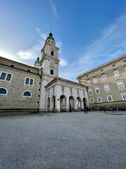 Salzburg, Austria - Nov 1 2023: Historic gate linking Residenzplatz to Domplatz in Salzburg, Austria. Ornate details and classical design frame a picturesque view of the city's landmarks. 