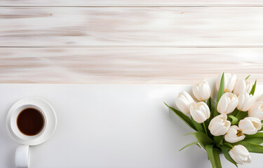 white wooden office table, coffee cup and flowers for freelancin