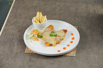 Katsu Curry and chesse on wood table