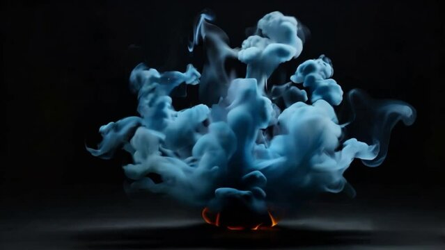 Blue smoke explosion on dark background