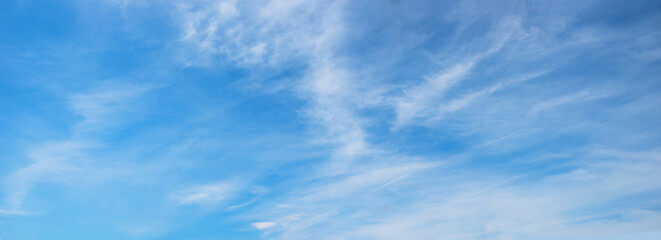 beautiful sky panorama with light feathery cirrus clouds in the atmosphere