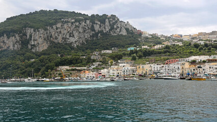Fototapeta na wymiar Cliffs of Capri Island in Campania Italy View From Sea