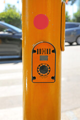 Pedestrian Push Button at Yellow Pole Traffic Light Street Crossing Italy