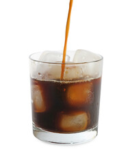 Pouring coffee into glass of ice cubes on white background