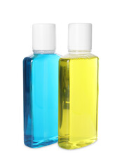 Two bottles of mouthwash isolated on white