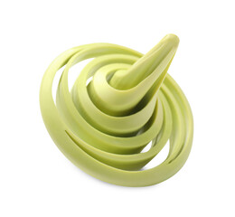 One green spinning top on white background