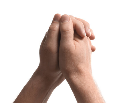 Religion. Christian man praying on white background, closeup