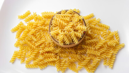 Variety of raw pasta, beautifully isolated against a white background, symbolizing the simplicity and versatility of Italian cuisine