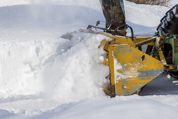 snowblower blowing snow