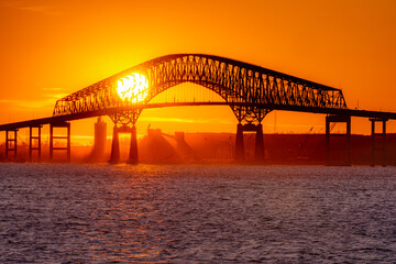Sun Setting behind Francis Scott Key Bridge - obrazy, fototapety, plakaty