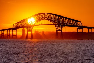 Deurstickers Sun Setting behind Francis Scott Key Bridge © GRP Imagery