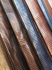 aluminum fine perforated sheet in five colors, dark brown, light gray, rose gold, grey and black. The colors should be uniform throughout the picture.