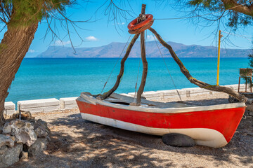Old boat on the shore. Kissamos, Crete, Greece