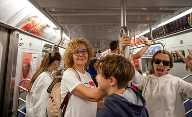 Joyful Subway Passengers in New York City