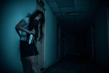 Portrait of asian woman make up ghost,Scary horror scene for background,Halloween festival...