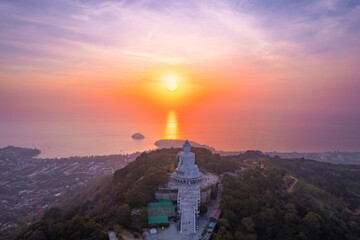 Statue big Buddha in Phuket on sunset sky, aerial top view. Concept travel Thailand landmark - obrazy, fototapety, plakaty