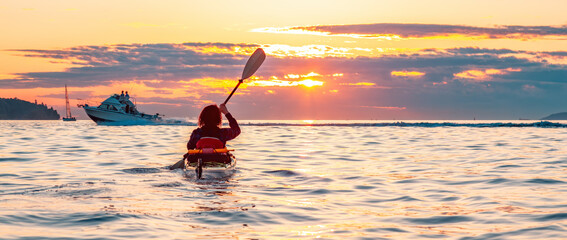 Kayaking at Colorful Sunset in Vancouver, BC, Canada