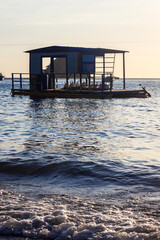 Postcard of the sunset in the beautiful bay of Santa Marta, Colombia, wallpaper of a beauty landscape, golden hour